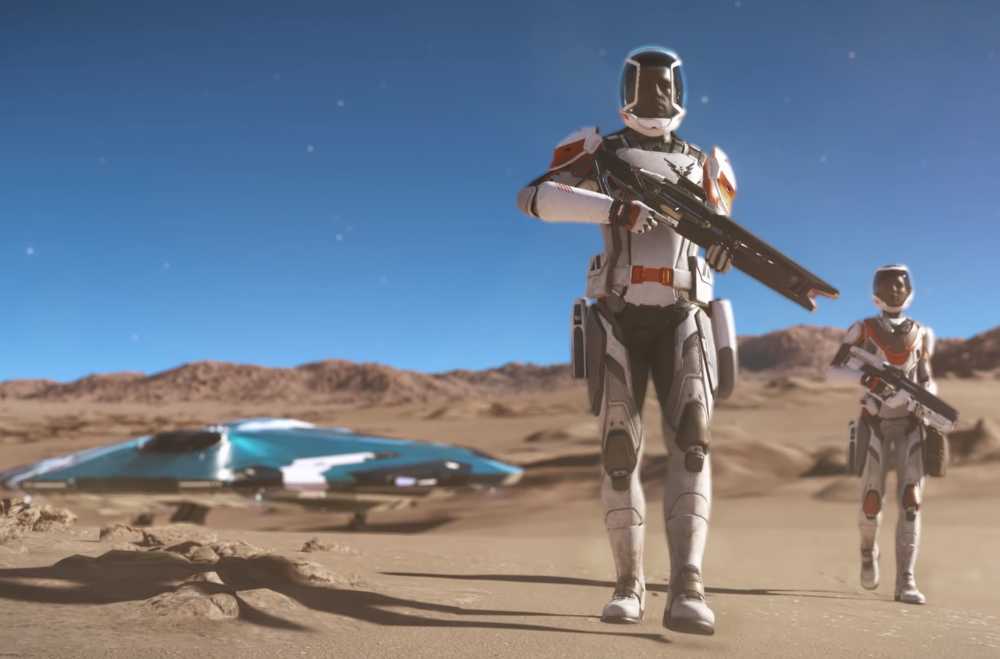 Zwei bewaffnete Astronauten gehen auf einem sandigen Planeten. Im Hintergrund sieht man ein kleines Raumschiff (Elite Dangerous: Odyssey)