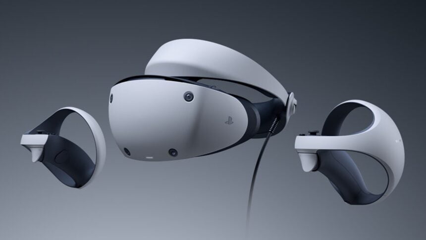 Playstation VR 2 und Sense-Controller vor grauem Hintergrund.