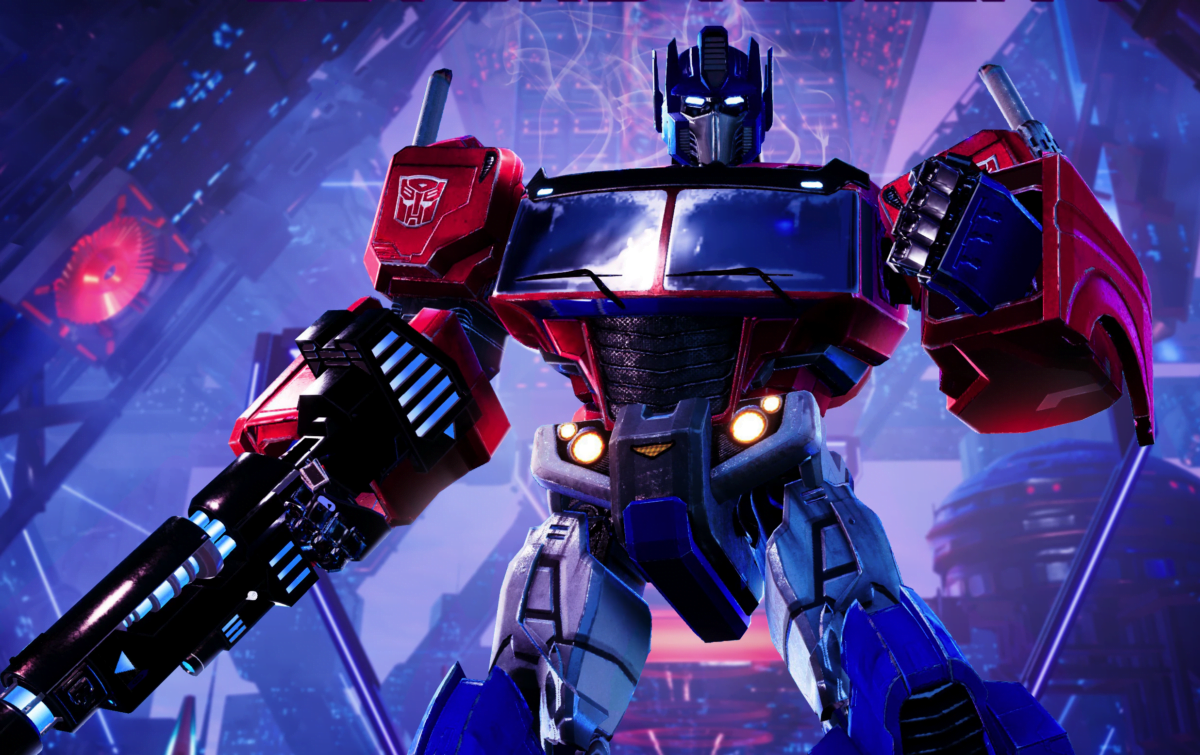 Ein Transformers-Kampfroboter posiert vor futuristischen Bauwerken.