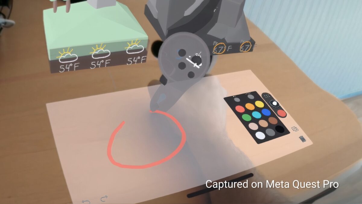 Ein VR-Nutzer zeichnen mit Quest Pro in Mixed Reality auf ein virtuelles Brett.