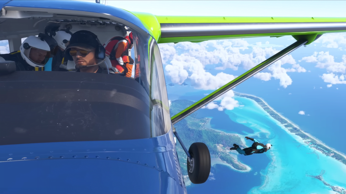 Blick auf ein paar aus dem Flugzeug abspringende Fallschirmspringer über einer Insel.