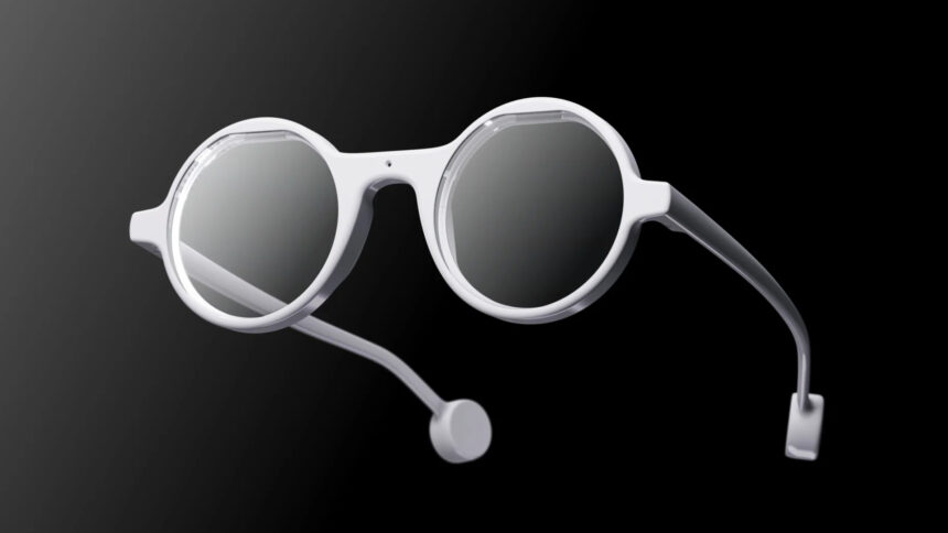Die Frame AI Smart Glasses mit einem runden, hellen Design auf schwarzem Hintergrund. 